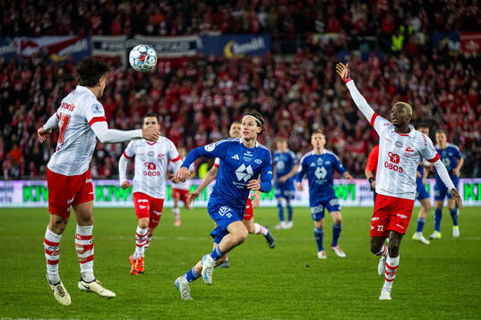 Mathias Fjørtoft Løvik of Molde and Maxwell Woledzi of