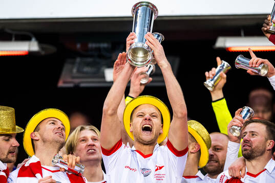Morten Bjørlo of Fredrikstad celebrates with the trophy