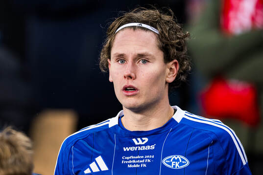 Mathias Fjørtoft Løvik of Molde looks dejected the cup