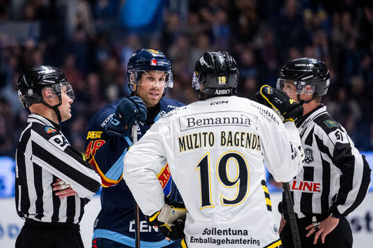 Djurgårdens Dick Axelsson och AIKs Daniel Muzito Bagenda