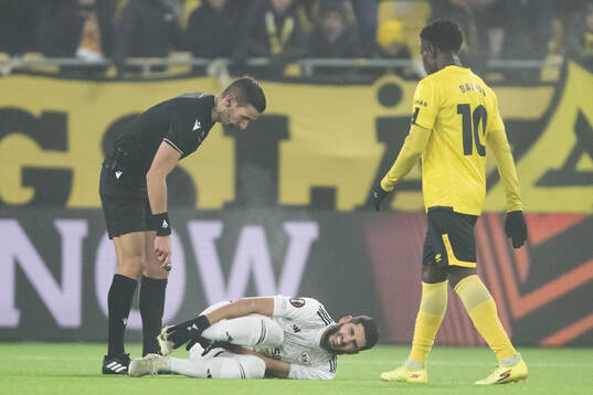 Referee Antonio Nobre checks