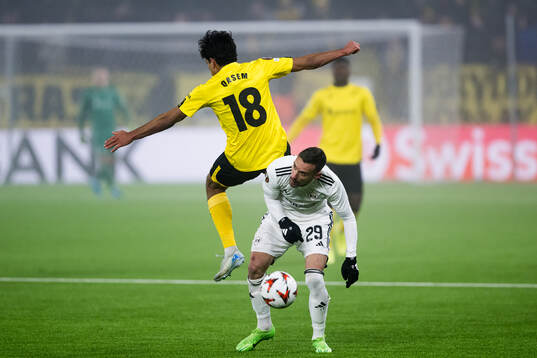 Ahmed Qasem of Elfsborg and Marko Vesovic of Qarabag