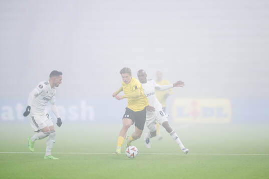 Matheus Silva and Julio Romao of Qarabag compete for the