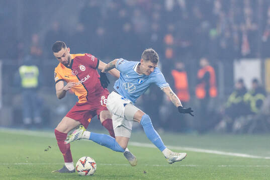 Berkan Kutlu of Galatasaray and Søren Rieks of Malmö FF