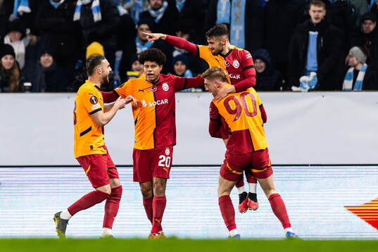 Yunus Akgun of Galatasaray celebrates with team mates