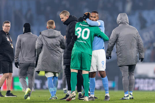 Goalkeeper Joakim Persson and Isaac Kiese Thelin of Malmö