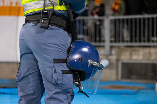 Security guard with helmet