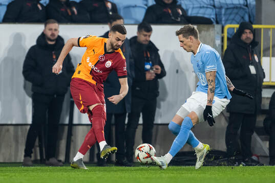 Berkan Kutlu of Galatasaray and Søren Rieks of Malmö FF