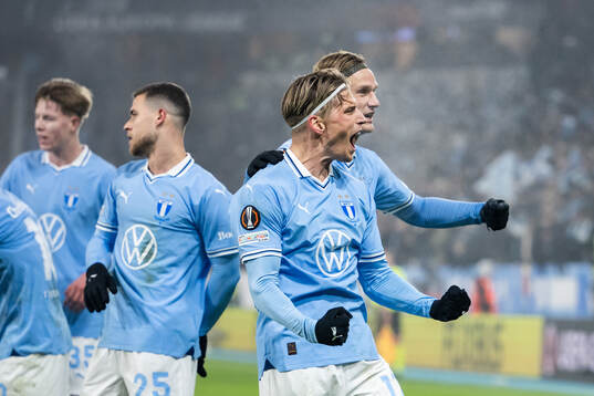 Jens Stryger Larsen and Erik Botheim of Malmö FF celebrate