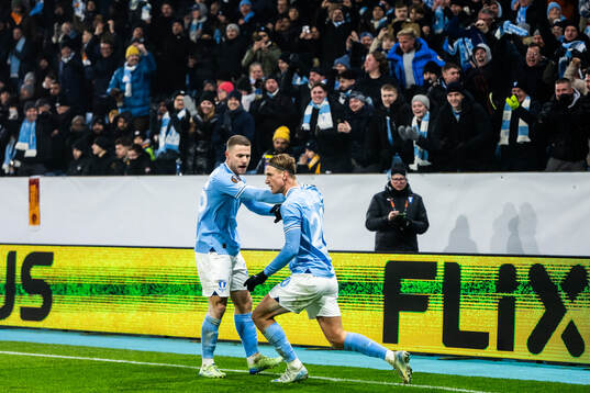 Gabriel Busanello and Erik Botheim of Malmö FF celebrate