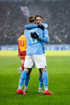 Jens Stryger Larsen and Erik Botheim of Malmö FF celebrate