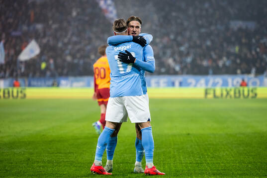 Jens Stryger Larsen and Erik Botheim of Malmö FF celebrate