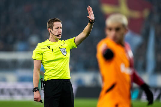 Referee John Brooks