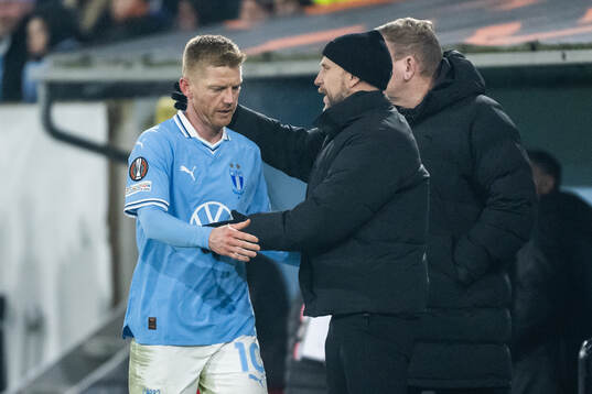 Anders Christiansen is substituted off and is greeted by