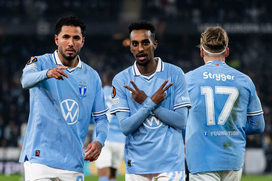 Sergio Pena and Taha Ali of Malmö FF celebrate