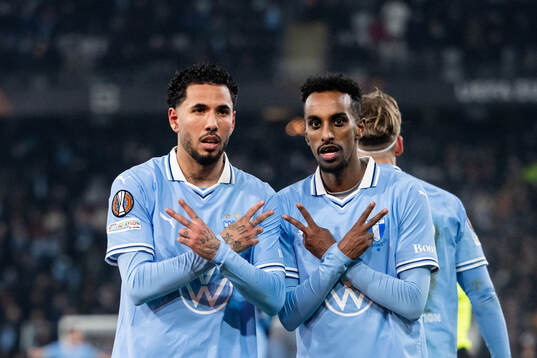 Sergio Pena and Taha Ali of Malmö FF celebrate