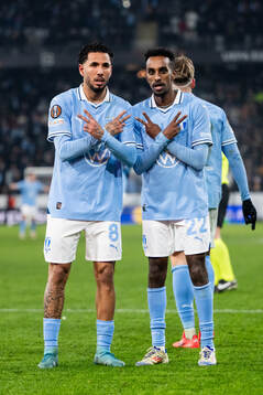 Sergio Pena and Taha Ali of Malmö FF celebrate