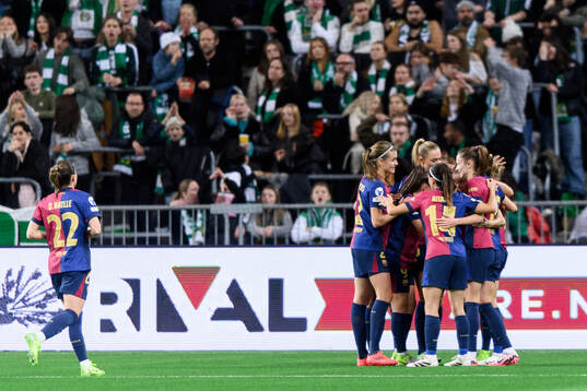Ewa Pajor of Barcelona celebrates with team mates