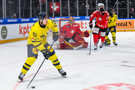 Jesper Fröden of Sweden in the ice hockey game between