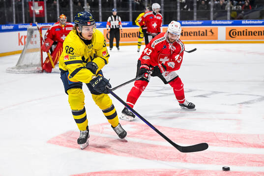 Linus Sandin of Sweden and Andrea Glauser of Switzerland in