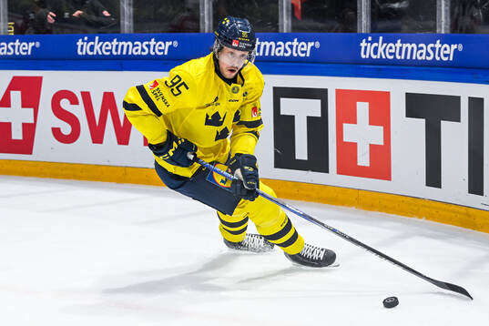 Jacob de la Rose of Sweden in the ice hockey game between