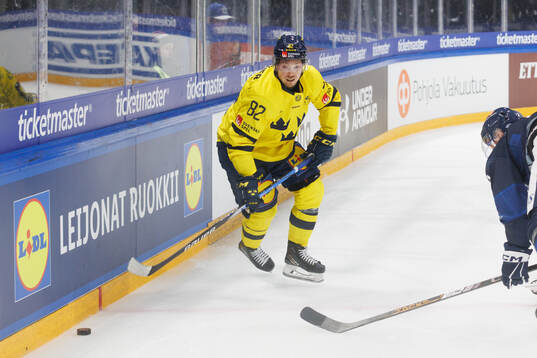 Jesper Frödén of Sweden in the ice hockey game between