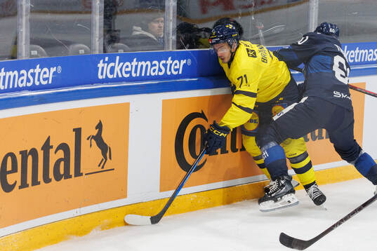 Isac Brännström of Sweden in the ice hockey game between