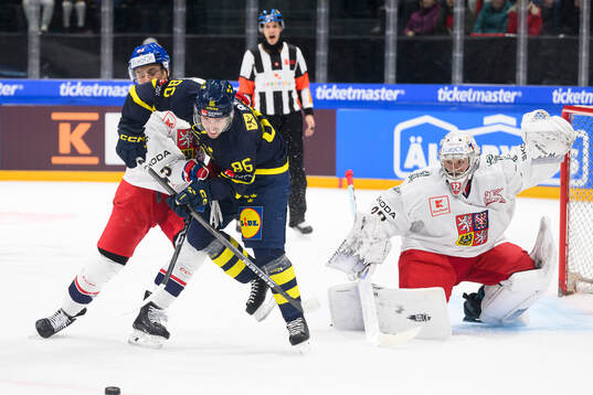 Mathias Bromé of Sweden in the ice hockey game between