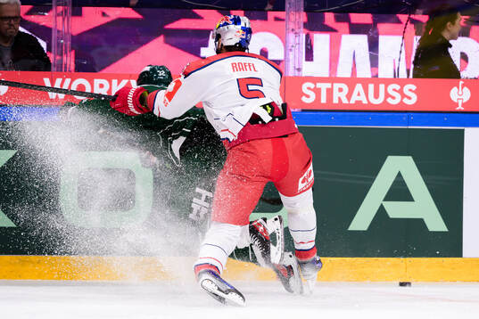 Magnus Nygren of Färjestad and Thomas Raffl of EC Red Bull