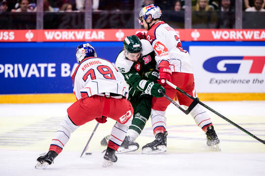 Philipp Krening of EC Red Bull Salzburg and Tyler Lewington