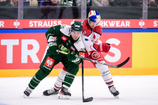 Wille Johansson of Färjestad  and Tyler Lewington of EC