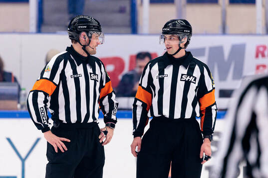 Domare David Laksola och Domare Johan Wedin