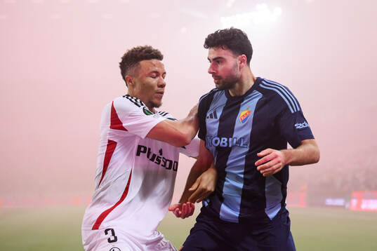 Steve Kapaudi of Legia Warszawa and Deniz Hummet of