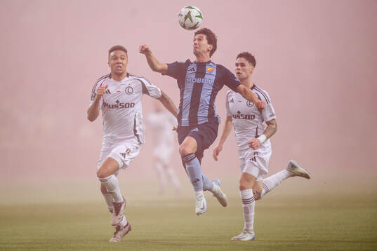 Steve Kapaudi of Legia Warszawa and Gustav Wikheim of