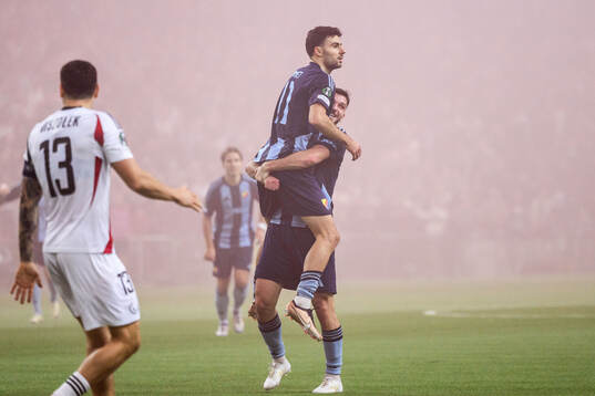 Deniz Hummet of Djurgården celebrates with Besard Sabovic