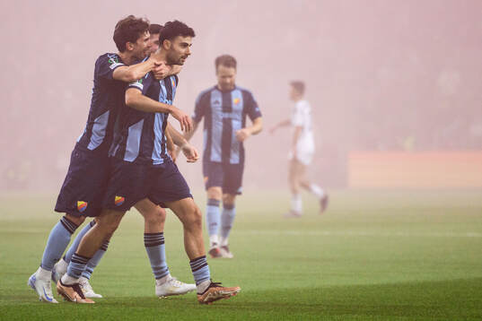Deniz Hummet of Djurgården celebrates with Besard Sabovic