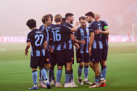 Deniz Hummet of Djurgården celebrates with team mates