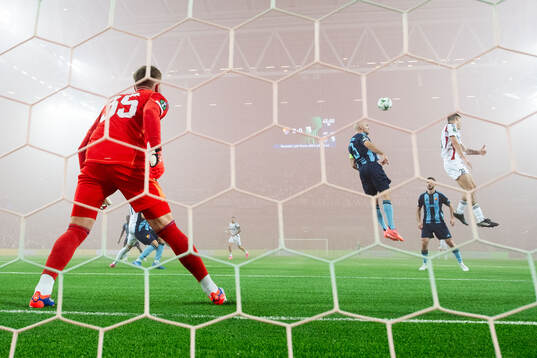 goalkeeper Jacob Rinne and Marcus Danielson of Djurgården