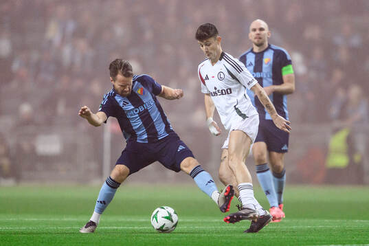 Jacob Larsson of Djurgården and Marc Gual of Legia Warszawa
