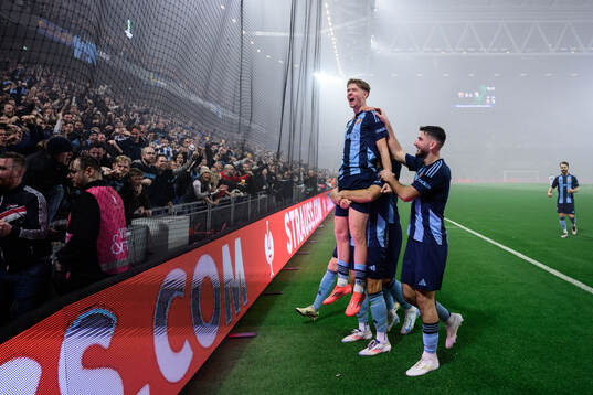 Patric Åslund of Djurgården celebrates with team mates