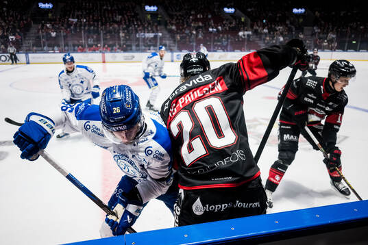 Leksands Patrik Norén och Malmö Redhawks Thomas Berg