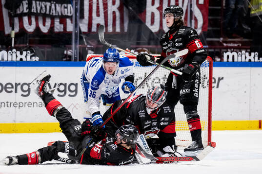 Malmö Redhawks Freddie Larsson och målvakt Marek