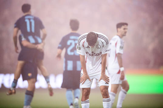 Jurgen Celhaka of Legia Warszawa looks dejected