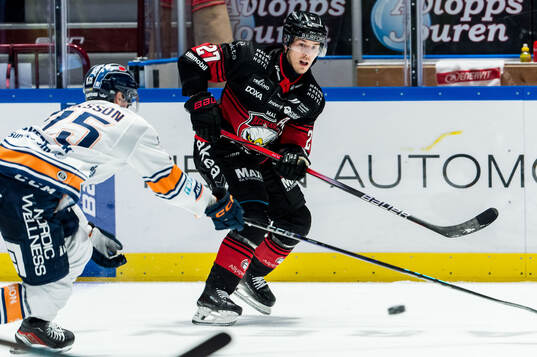 Malmö Redhawks Henrik Haapala och Växjös Filip Eriksson