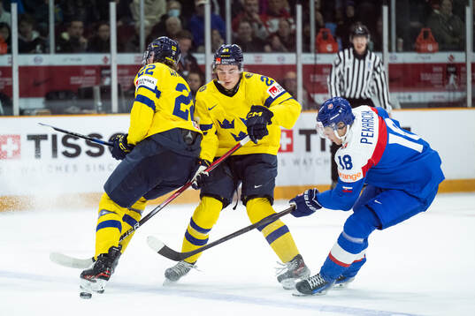 Anton Wahlberg and Tom Willander of Sweden compete for the