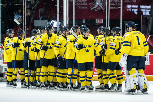 Players of Sweden celebrate