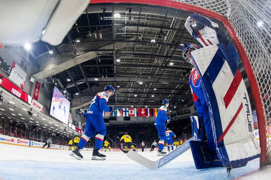 Goaltender Samuel Urban of Slovakia looks dejected