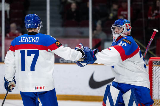 Daniel Jencko celebrates with goaltender Samuel Urban of
