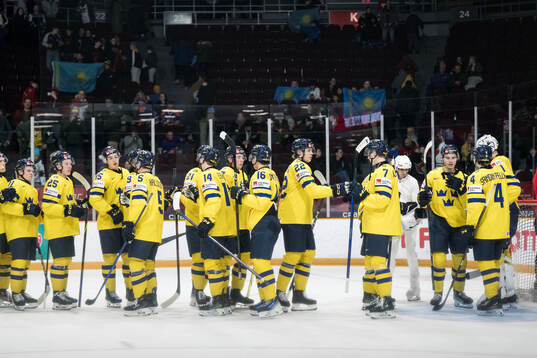 Players of Sweden celebrate