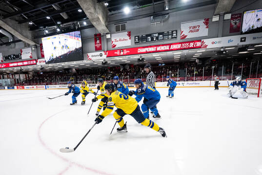 Linus Eriksson and Oskar Voullet of Sweden compete for the